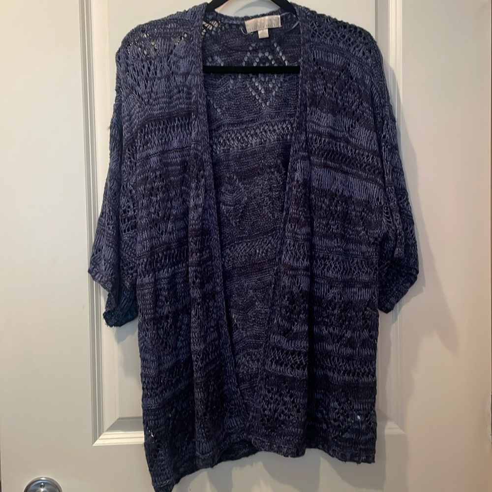 Carolyn Taylor dark blue knit sweater.